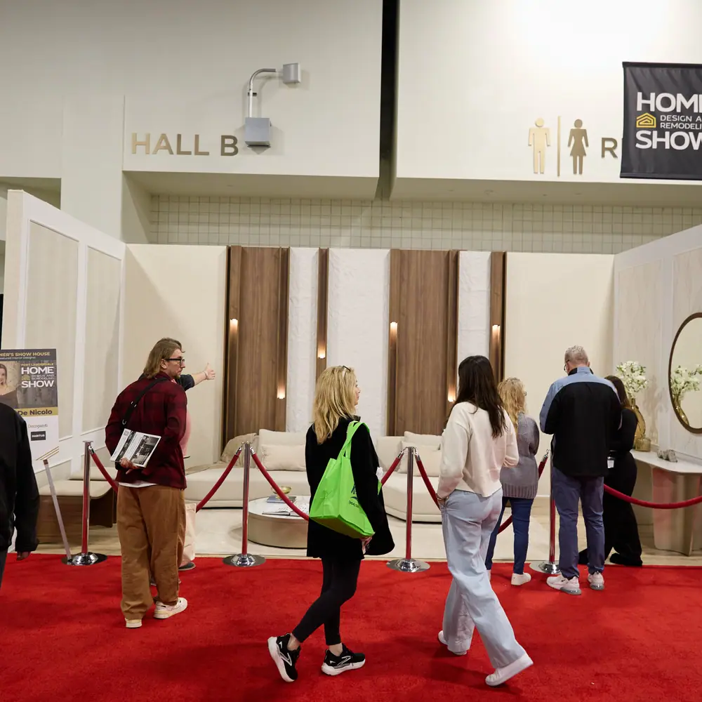 Visitors lining up to view the Designer Show House display in Hall B at the home show