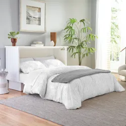 White murphy cabinet bed fully deployed showing a made queen bed with grey blanket and flanking shelves