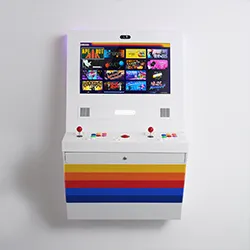 White wall-mounted arcade cabinet with rainbow stripe base and large touchscreen game menu, front view