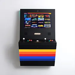Black wall-mounted arcade cabinet with rainbow stripe base and large touchscreen, front view