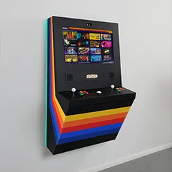 Black wall-mounted arcade cabinet with rainbow stripe base, angled view showing slim depth